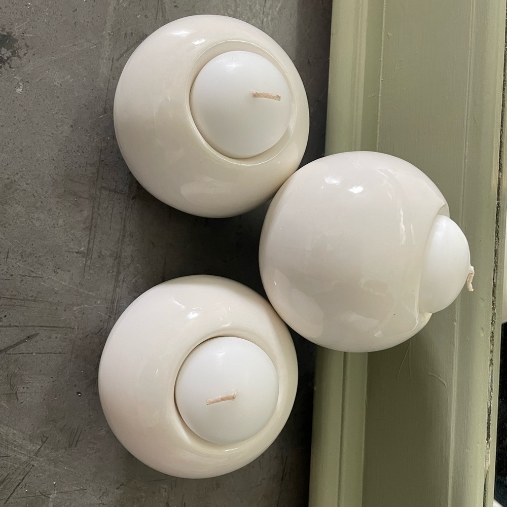 3 inches tall candle holders with candle.